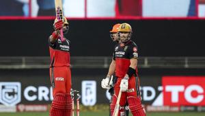 Royal Challengers Bangalore batsman Devdutt Padikkal raises his bat after completing a half-century.(PTI) Royal Challengers Bangalore batsman Devdutt Padikkal raises his bat after completing a half-century.(PTI)