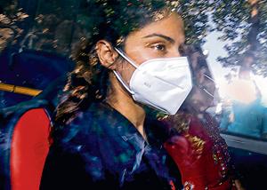 Bollywood actor Rhea Chakraborty is seen in this file photo in Mumbai. Chakraborty was arrested on September 8 by the Narcotics Control Bureau (NCB)after three days of questioning over the drug abuse case in connection with the death of Sushant Singh Rajput(PTI Photo) Bollywood actor Rhea Chakraborty is seen in this file photo in Mumbai. Chakraborty was arrested on September 8 by the Narcotics Control Bureau (NCB)after three days of questioning over the drug abuse case in connection with the death of Sushant Singh Rajput(PTI Photo)