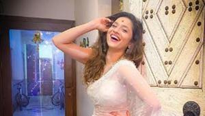 Ankita Lokhande poses in a white saree, shares secret to happiness.