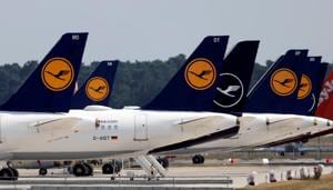 FILE PHOTO: Airplanes of German carrier Lufthansa are parked at the Berlin Schoenefeld airport, amid the spread of the coronavirus disease (COVID-19) outbreak in Schoenefeld, Germany, June 25, 2020. REUTERS/Fabrizio Bensch/File Photo