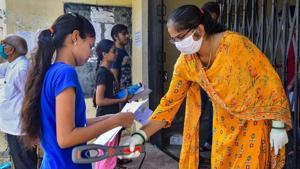 Students undergo checking in front of an examination centre in Rajasthan. (File photo: PTI)(PTI) Students undergo checking in front of an examination centre in Rajasthan. (File photo: PTI)(PTI)