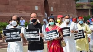Senior Congress MP Ghulam Nabi Azad and other Opposition lawmakers march from Gandhi statue to Ambedkar statue in protest against the recent farm and labour bills, during the ongoing Monsoon Session, at Parliament House in New Delhi, Wednesday.(PTI)