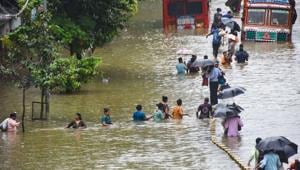People wade through a waterlogged street at Parel area, after heavy monsoon rain, in Mumbai, Wednesday, Sept. 23, 2020.(PTI photo) People wade through a waterlogged street at Parel area, after heavy monsoon rain, in Mumbai, Wednesday, Sept. 23, 2020.(PTI photo)