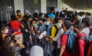 Students, not adhering to social distancing norms, stand in queues at the counter to submit their documents for admission at Chaudhary Mahadev Prasad Degree College in Prayagraj.(PTI) Students, not adhering to social distancing norms, stand in queues at the counter to submit their documents for admission at Chaudhary Mahadev Prasad Degree College in Prayagraj.(PTI)