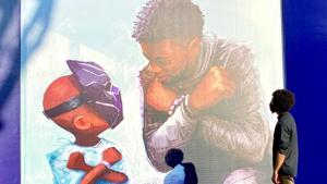 Nikkolas Smith stands next to his tribute for Chadwick Boseman at Disneyland California.(Instagram) Nikkolas Smith stands next to his tribute for Chadwick Boseman at Disneyland California.(Instagram)