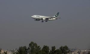 FILE PHOTO: A Pakistan International Airlines (PIA) passenger plane arrives at the Benazir International airport in Islamabad, Pakistan, December 2, 2015. REUTERS/Faisal Mahmood/File Photo FILE PHOTO: A Pakistan International Airlines (PIA) passenger plane arrives at the Benazir International airport in Islamabad, Pakistan, December 2, 2015. REUTERS/Faisal Mahmood/File Photo