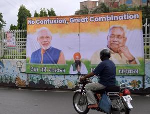 A poster of Prime Minister Narendra Modi with Bihar Chief Minister Nitish Kumar at Income Tax roundabout, in Patna, Bihar (Photo by Santosh Kumar/ Hindustan Times) A poster of Prime Minister Narendra Modi with Bihar Chief Minister Nitish Kumar at Income Tax roundabout, in Patna, Bihar (Photo by Santosh Kumar/ Hindustan Times)