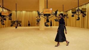 A model presents a creation from the Prada Spring/Summer 2021 women's collection during fashion week in Milan, Italy, in this handout photo released on September 24, 2020.(via REUTERS) A model presents a creation from the Prada Spring/Summer 2021 women's collection during fashion week in Milan, Italy, in this handout photo released on September 24, 2020.(via REUTERS)