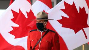 A Royal Canadian Mounted Police officer stands guard outside the Senate of Canada prior to the Speech from the Throne on September 23 in Ottawa, Canada.(AFP) A Royal Canadian Mounted Police officer stands guard outside the Senate of Canada prior to the Speech from the Throne on September 23 in Ottawa, Canada.(AFP)