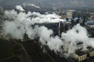 Smoke and steam rise from a coal processing plant in Hejin in central China's Shanxi Province. Chinese President Xi Jinping says his country will aim to stop pumping additional carbon dioxide, the main global warming gas, into the atmosphere by 2060.(AP) Smoke and steam rise from a coal processing plant in Hejin in central China's Shanxi Province. Chinese President Xi Jinping says his country will aim to stop pumping additional carbon dioxide, the main global warming gas, into the atmosphere by 2060.(AP)