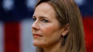 US Court of Appeals for the Seventh Circuit Judge Amy Coney Barrett looks on as US president Donald Trump announced her as his nominee to fill the Supreme Court seat left vacant by the death of Justice Ruth Bader Ginsburg, who died on September 18.(Reuters Photo) US Court of Appeals for the Seventh Circuit Judge Amy Coney Barrett looks on as US president Donald Trump announced her as his nominee to fill the Supreme Court seat left vacant by the death of Justice Ruth Bader Ginsburg, who died on September 18.(Reuters Photo)