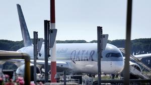A Qatar Airways aircraft is parked at Rome's Leonardo Da Vinci international airport, Wednesday, July 8, 2020.(AP)