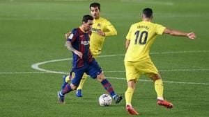Lionel Messi with the ball against Roma.(Getty Images) Lionel Messi with the ball against Roma.(Getty Images)