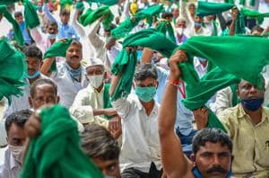 Bengaluru: Farmers protest against the passage of new farm bills in the Parliament and land legislations proposed by the Karnataka government, in Bengaluru, Tuesday, Sept. 22, 2020. (PTI Photo/Shailendra Bhojak)
