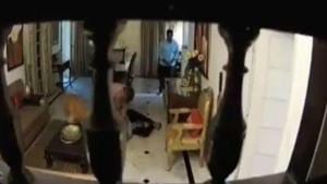 In a less than five-minute video clip, teh IPS officer is purportedly seen pushing, hitting and pinning down his wife. (Videograb) In a less than five-minute video clip, teh IPS officer is purportedly seen pushing, hitting and pinning down his wife. (Videograb)