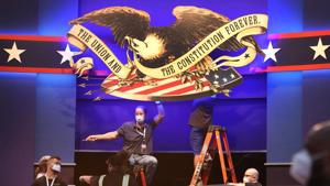 Workers prepare the stage for the first presidential debate between U.S. President Donald Trump and Democratic presidential nominee Joe Biden at Case Western Reserve University and the Cleveland Clinic on September 28 in Cleveland, Ohio.(AFP) Workers prepare the stage for the first presidential debate between U.S. President Donald Trump and Democratic presidential nominee Joe Biden at Case Western Reserve University and the Cleveland Clinic on September 28 in Cleveland, Ohio.(AFP)