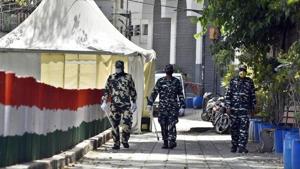 Paramilitary personnel at the cordoned off entry route to Tablighi Jamaat's Alami Markaz Banglewali Masjid building in New Delhi, in April.(HT file) Paramilitary personnel at the cordoned off entry route to Tablighi Jamaat's Alami Markaz Banglewali Masjid building in New Delhi, in April.(HT file)