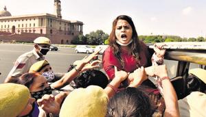 A Congress party worker shouts slogans while being detained during a flash protest against Hathras gang-rape at Vijay Chowk, near Parliament House in New Delhi on Tuesday.(Sanjeev Verma/HT Photo) A Congress party worker shouts slogans while being detained during a flash protest against Hathras gang-rape at Vijay Chowk, near Parliament House in New Delhi on Tuesday.(Sanjeev Verma/HT Photo)