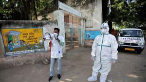 A healthcare worker announces to people to get their rapid antigen tests done during a door-to-door survey for the coronavirus disease (COVID-19), in Jakhan village in the western state of Gujarat.(REUTERS) A healthcare worker announces to people to get their rapid antigen tests done during a door-to-door survey for the coronavirus disease (COVID-19), in Jakhan village in the western state of Gujarat.(REUTERS)