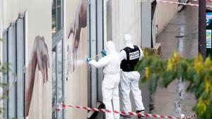 Forensic experts investigate the scene of an incident near the former offices of French magazine Charlie Hebdo, in Paris.(REUTERS) Forensic experts investigate the scene of an incident near the former offices of French magazine Charlie Hebdo, in Paris.(REUTERS)