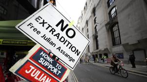 Free Assange banners are tied opposite the Old Bailey in London on October 1, 2020.(AP Photo) Free Assange banners are tied opposite the Old Bailey in London on October 1, 2020.(AP Photo)
