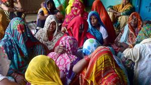 Relatives of the rape victim mourns as she dies at Safdarjung hospital, at the village of Hathras district on Tuesday.(ANI) Relatives of the rape victim mourns as she dies at Safdarjung hospital, at the village of Hathras district on Tuesday.(ANI)