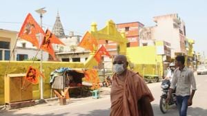 Residents walk past Hanuman Garhi temple, after a special CBI delivered its verdict in the 1992 Babri mosque demolition accused case, in Ayodhya.(PTI) Residents walk past Hanuman Garhi temple, after a special CBI delivered its verdict in the 1992 Babri mosque demolition accused case, in Ayodhya.(PTI)