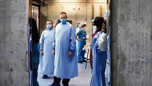 A doctor wears protective gear in a hospital in Haifa, north Israel.(Reuters) A doctor wears protective gear in a hospital in Haifa, north Israel.(Reuters)