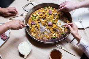 Venetian paella cooked in a wood-fired oven by Michelin-starred chef Quique Dacosta in London.(ArrosQD) Venetian paella cooked in a wood-fired oven by Michelin-starred chef Quique Dacosta in London.(ArrosQD)