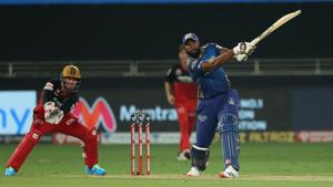 Dubai: Mumbai Indians batsman Kieron Pollard plays a shot during the Indian Premier League 2020 cricket match against Royal Challengers Bangalore, at Dubai International Cricket Stadium, Dubai, Monday, Sept. 28, 2020.(PTI) Dubai: Mumbai Indians batsman Kieron Pollard plays a shot during the Indian Premier League 2020 cricket match against Royal Challengers Bangalore, at Dubai International Cricket Stadium, Dubai, Monday, Sept. 28, 2020.(PTI)