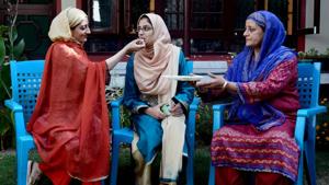 J&K civil services examination topper Kamila Mushtaq ‘s sister offers her sweets in Srinagar on Thursday.(ANI) J&K civil services examination topper Kamila Mushtaq ‘s sister offers her sweets in Srinagar on Thursday.(ANI)
