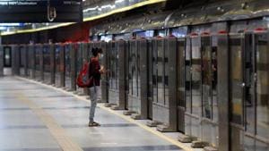A woman wearing a face mask waits at a Delhi metro train platform.(REUTERS) A woman wearing a face mask waits at a Delhi metro train platform.(REUTERS)