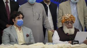 Maulana Fazlur Rehman (front right) reads out a statement at a press briefing following a meeting of the opposition alliance in Islamabad on September 20.(AP file) Maulana Fazlur Rehman (front right) reads out a statement at a press briefing following a meeting of the opposition alliance in Islamabad on September 20.(AP file)