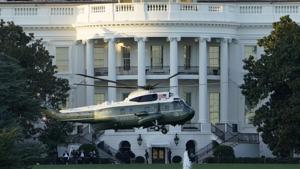 Marine One lifts off from the White House to take US President Donald Trump to the Walter Reed National Military Medical Center in Bethesda on Friday.(AP)