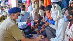 Additional Chief Secretary of Uttar Pradesh Awanish Kumar Awasthi meets the family members of a 19-year-old Dalit woman at Bulgadi village in Hathras.(PTI) Additional Chief Secretary of Uttar Pradesh Awanish Kumar Awasthi meets the family members of a 19-year-old Dalit woman at Bulgadi village in Hathras.(PTI)