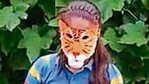 Students created masks of endangered animals like tiger during the event.(HT) Students created masks of endangered animals like tiger during the event.(HT)