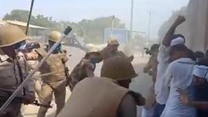 Video footage shows cops raining lathis as RLD cadre formed a protective ring around Jayant Chaudhary. (Videograb) Video footage shows cops raining lathis as RLD cadre formed a protective ring around Jayant Chaudhary. (Videograb)