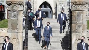 Justin Trudeau, Canada's prime minister (centre) walks to attend a news conference in Ottawa, Ontario, Canada, on October 1.(Bloomberg) Justin Trudeau, Canada's prime minister (centre) walks to attend a news conference in Ottawa, Ontario, Canada, on October 1.(Bloomberg)