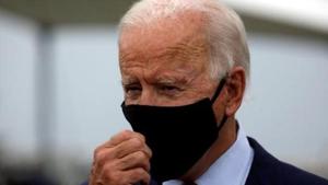 Democratic US presidential nominee Joe Biden adjusts his protective face mask.(Reuters File Photo) Democratic US presidential nominee Joe Biden adjusts his protective face mask.(Reuters File Photo)