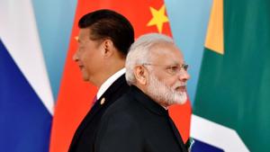 Chinese President Xi Jinping and Indian Prime Minister Narendra Modi attend the group photo session during the BRICS Summit at the Xiamen International Conference and Exhibition Center in Xiamen, southeastern China's Fujian Province, China September 4, 2017. REUTERS/Kenzaburo Fukuhara/Pool(REUTERS) Chinese President Xi Jinping and Indian Prime Minister Narendra Modi attend the group photo session during the BRICS Summit at the Xiamen International Conference and Exhibition Center in Xiamen, southeastern China's Fujian Province, China September 4, 2017. REUTERS/Kenzaburo Fukuhara/Pool(REUTERS)
