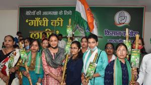 UP Kisan Congress distributes lathis among farmers and women for self defence, during party's 'Gandhi ki Lathi' campaign, in Lucknow on Tuesday.(PTI) UP Kisan Congress distributes lathis among farmers and women for self defence, during party's 'Gandhi ki Lathi' campaign, in Lucknow on Tuesday.(PTI)