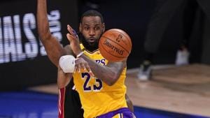 Los Angeles Lakers forward LeBron James passes against the Miami Heat during the second half in Game 4 of basketball's NBA Finals.(AP) Los Angeles Lakers forward LeBron James passes against the Miami Heat during the second half in Game 4 of basketball's NBA Finals.(AP)