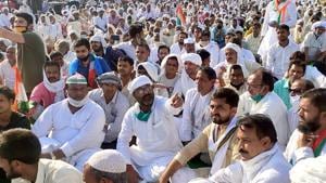 Uttar Pradesh Congress committee president Ajay Kumar Lallu along with party workers staged a protest against the farm bills in Muzaffarnagar.(ANI Photo) Uttar Pradesh Congress committee president Ajay Kumar Lallu along with party workers staged a protest against the farm bills in Muzaffarnagar.(ANI Photo)