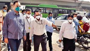 PWD minister Satyender Jain inspects Ashram Chowk after HT’s report pointed out the traffic mess in the area.(Sanjeev Verma/HT Photo) PWD minister Satyender Jain inspects Ashram Chowk after HT’s report pointed out the traffic mess in the area.(Sanjeev Verma/HT Photo)
