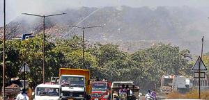 Plumes of smoke billowing from the smouldering heaps of solid waste at the dumping ground in Dadumajra, while firemen continue to bring the situation under control, in Chandigarh on Wednesday.(KESHAV SINGH/HT) Plumes of smoke billowing from the smouldering heaps of solid waste at the dumping ground in Dadumajra, while firemen continue to bring the situation under control, in Chandigarh on Wednesday.(KESHAV SINGH/HT)