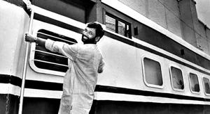 The then minister for railways, Ram Vilas Paswan, hangs outside a coach at the inauguration of the Railway Pavilion at Pragati Maidan on June 4, 1997.(HT Archive) The then minister for railways, Ram Vilas Paswan, hangs outside a coach at the inauguration of the Railway Pavilion at Pragati Maidan on June 4, 1997.(HT Archive)