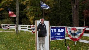 Signs supporting US President Donald Trump stand in the front yard of a home in Bainbridge, Ohio, US on September 30, 2020.(Reuters File Photo) Signs supporting US President Donald Trump stand in the front yard of a home in Bainbridge, Ohio, US on September 30, 2020.(Reuters File Photo)
