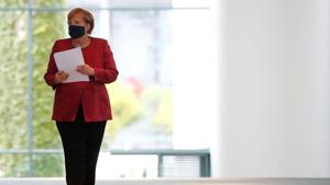 German Chancellor Angela Merkel arrives for a media statement after a video conference with mayors of German cities on the spread of the coronavirus disease (COVID-19), in Berlin, Germany.(REUTERS) German Chancellor Angela Merkel arrives for a media statement after a video conference with mayors of German cities on the spread of the coronavirus disease (COVID-19), in Berlin, Germany.(REUTERS)