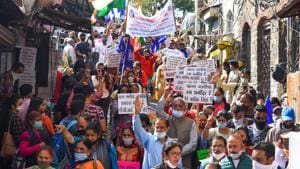 People raise slogans during a protest march demanding justice for Hathras victim, in Shimla, Friday.(PTI Photo) People raise slogans during a protest march demanding justice for Hathras victim, in Shimla, Friday.(PTI Photo)