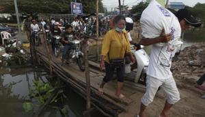 Flooding in Cambodia has killed at least 11 people since the beginning of the month, a disaster official said Sunday.(AP photo) Flooding in Cambodia has killed at least 11 people since the beginning of the month, a disaster official said Sunday.(AP photo)
